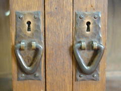 Detail hand hammered copper pulls.